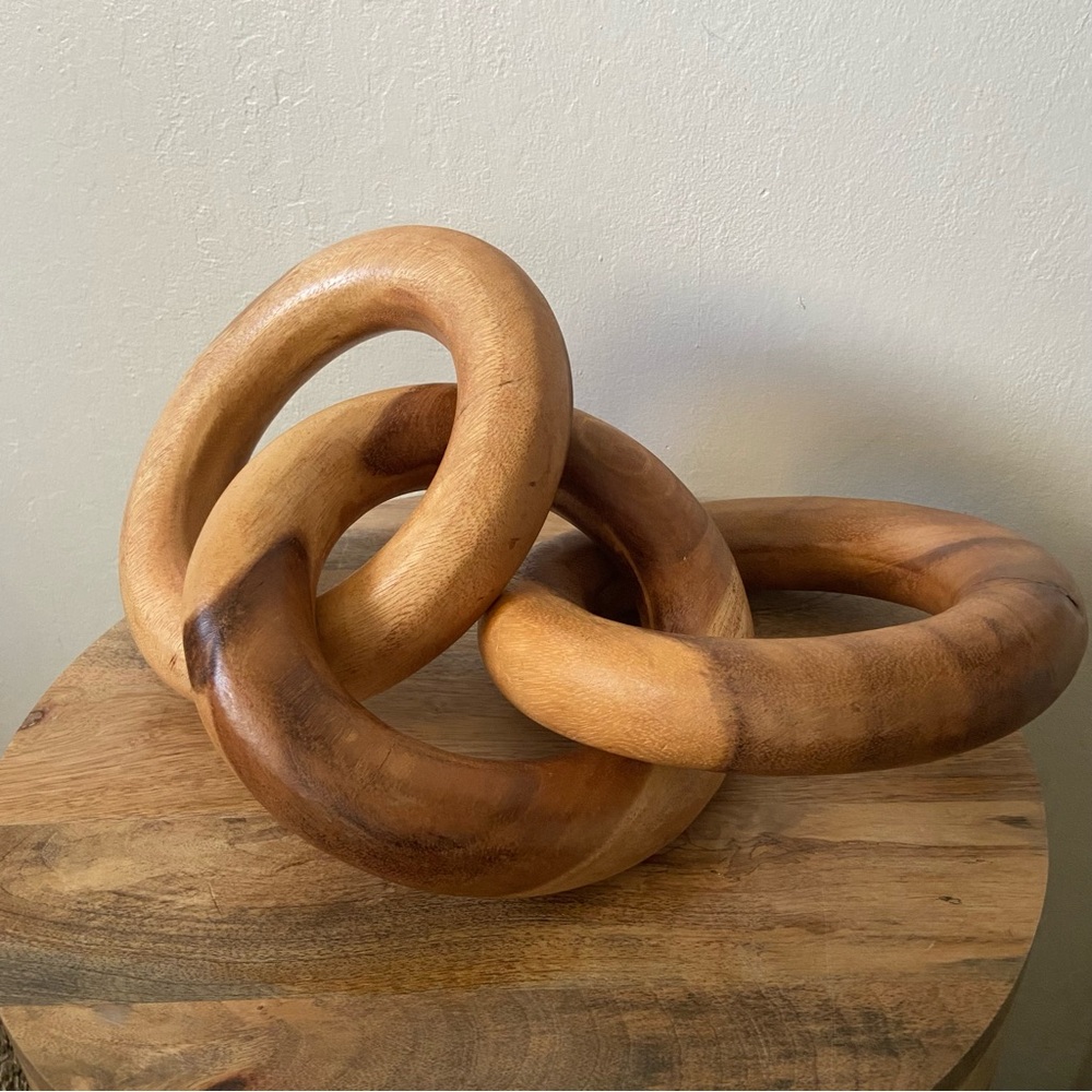 Three Oversized Intertwined Wood Rings Sculpture